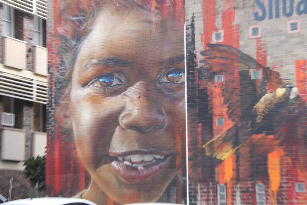 Street art: Indigenous artist Matt Adnate celebrated Nowra's rich Indigenous history with a portrait of a young Aboriginal boy.