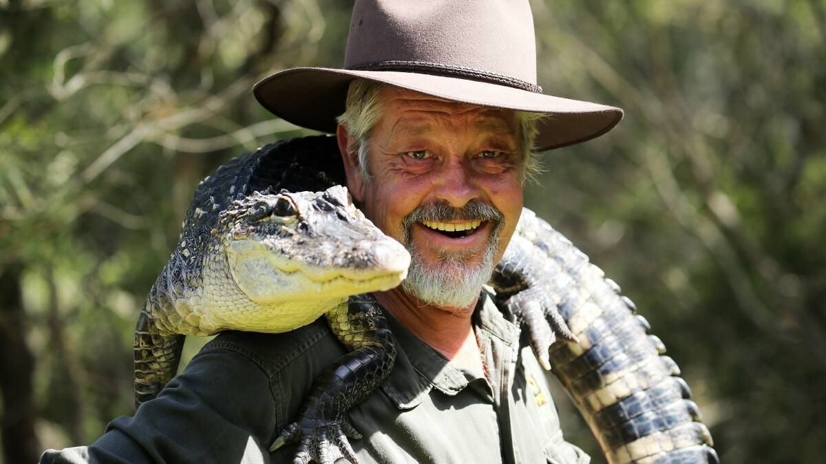 SNAP HAPPY: Ranger Mick Tate has been introducing audiences to Australian animals for almost 30 years at the Australian Reptile Park in NSW.