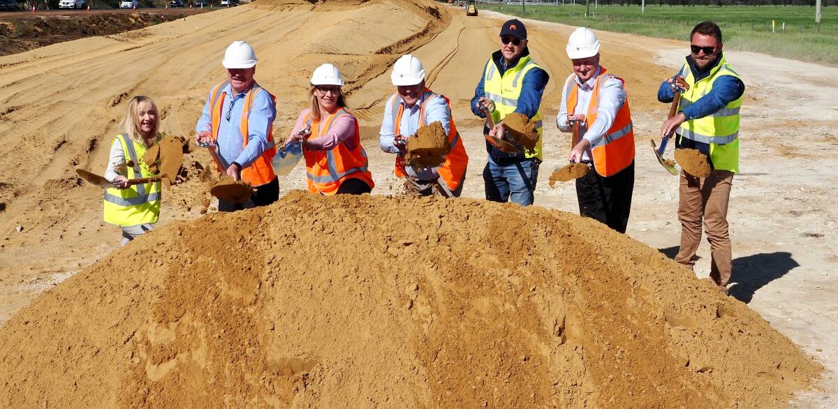 Federal and state government representatives turn the sod for construction on the dual carriageway of the Bussell Highway. Photo supplied.