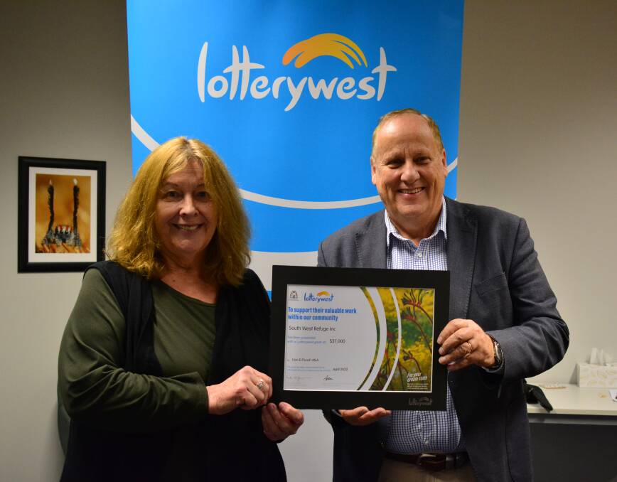 Support: South West Refuge chief executive officer Ali White with Bunbury MLA Don Punch and a grant from Lotterywest.