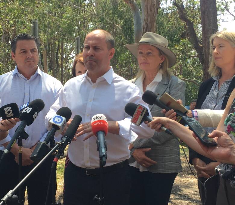 Federal treasurer Josh Frydenberg addresses the press conference flanked by Cowper MP Pat Conaghan, Environment Minister Sussan Ley and Threatened Species Commissioner Dr Sally Box. Port Macquarie MP Leslie Williams is in the background.