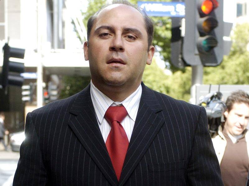Two inmates who allegedly attacked Tony Mokbel in a Victorian jail have fronted court via videolink.