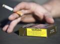 NZ's coalition agreed to repeal world-leading laws which aimed to reduce harm from cigarette smoking (Regi Varghese/AAP PHOTOS)