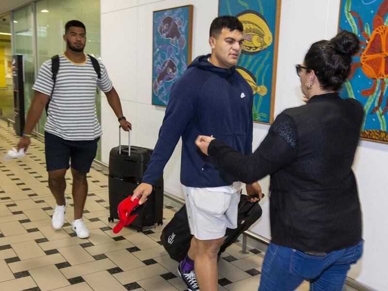David Fifita is greeted by his mother as he arrives at Brisbane International Airport on Tuesday.