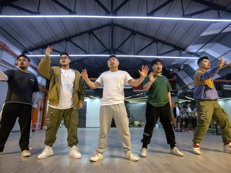 Chinese group Produce Pandas are hoping to break down boy band stereotypes in the music industry.