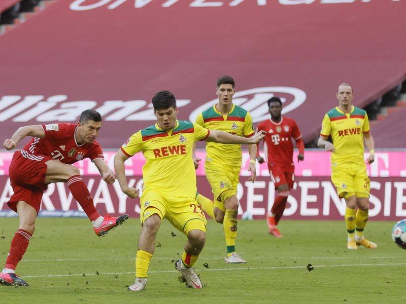 Bayern's Robert Lewandowski scoring one of his brace against Cologne in the 5-1 hammering.