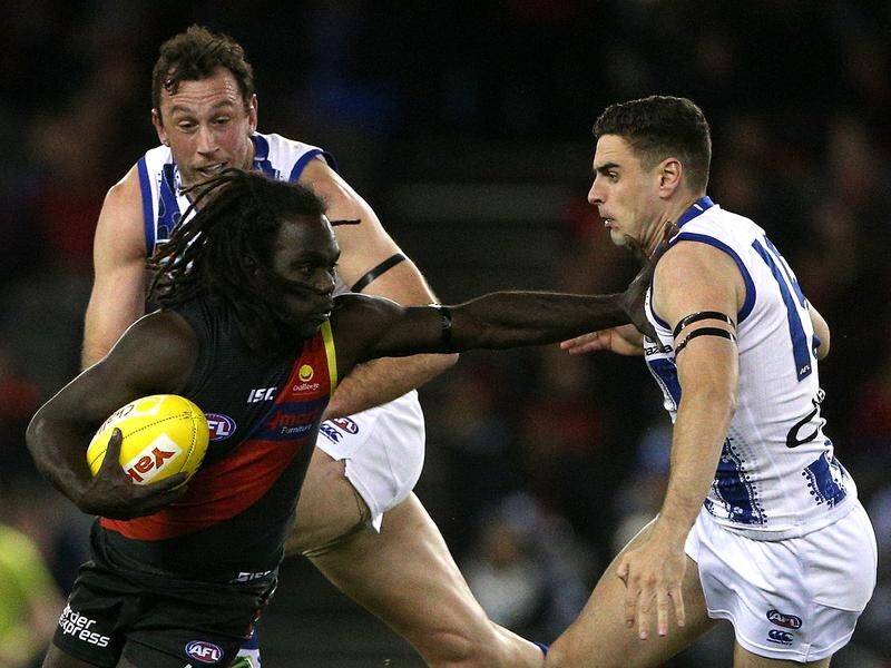 Four Anthony McDonald-Tipungwuti goals have led Essendon to a tight AFL win over North Melbourne