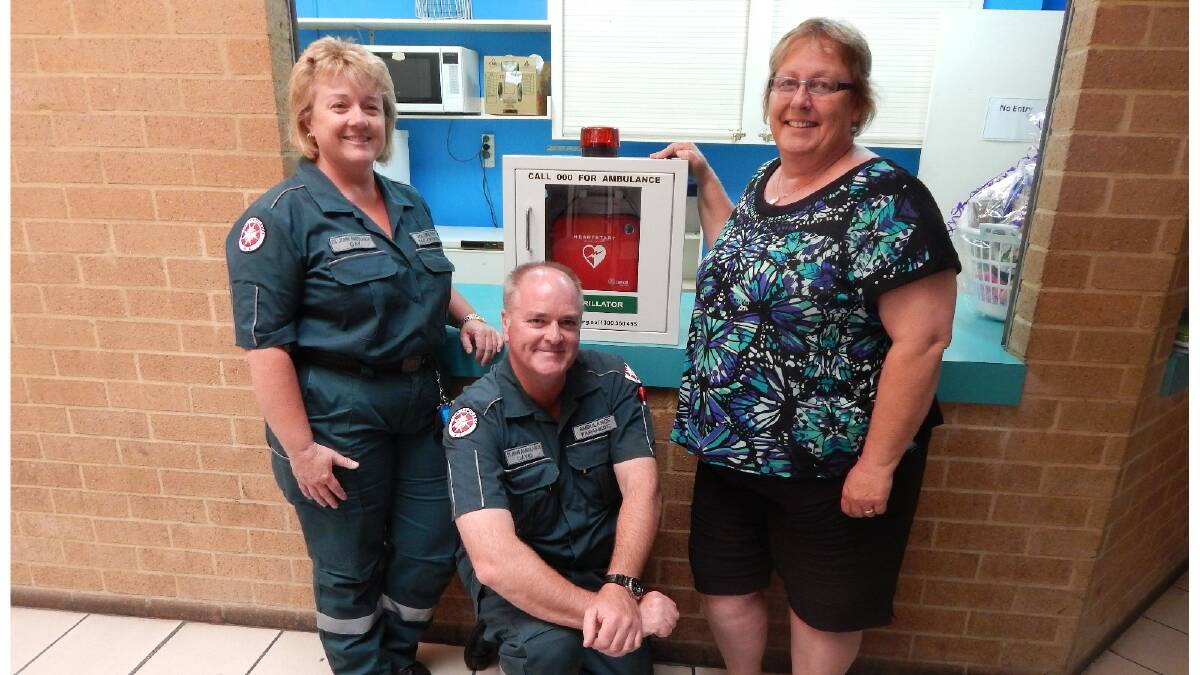 Volunteer ambulance officer Gay Paterson, paramedic David Maxwell and PCYC centre manager Sue Graham take delivery of the new defibrillator at Collie PCYC. Photo: Angela Clutterbuck/Collie Mail.
