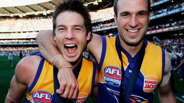 Ben Cousins, pictured here in happier times with Chris Judd, is in trouble with the police again. Photo: Mark Dadswell via Getty Images