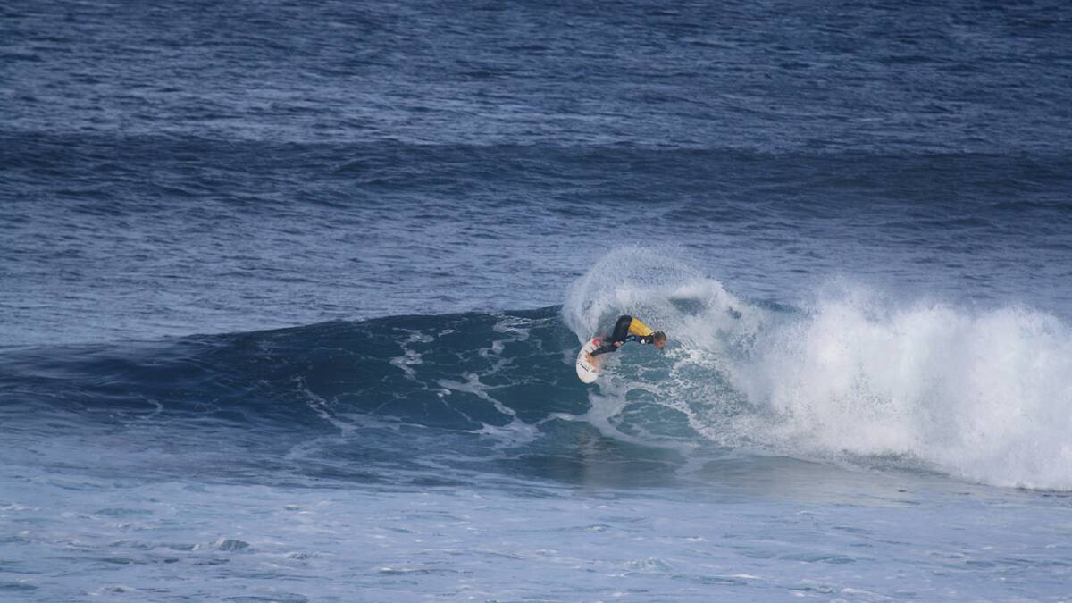 Round two of the women's heats saw Coco Ho, Dimity Stoyle, Sally Fitzgibbons, Paige Hareb and Johanne Defay advance to the third round while across the channel some of the men were scoring barrels at The Box. Photo by Sandy Powell. 