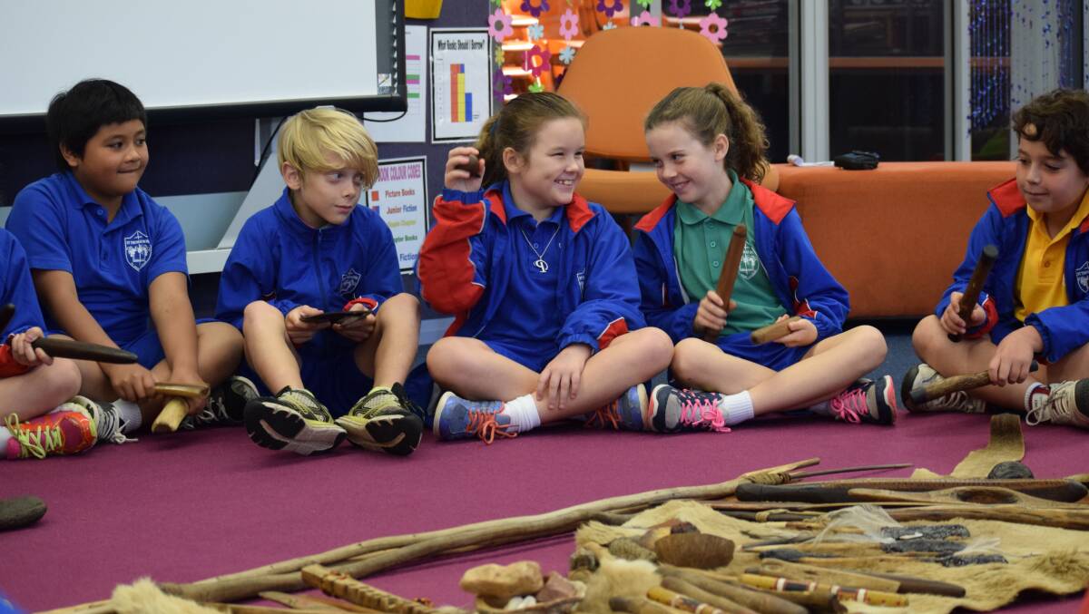 Students from St Thomas More played percussion to a didgeridoo beat. 