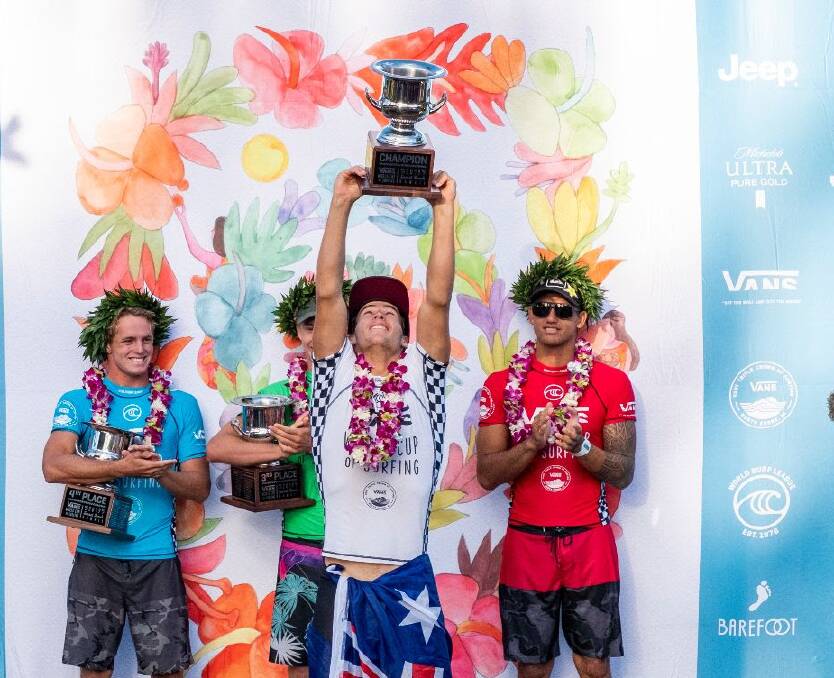 Jack Robinson feeling on top of the world after a massive victory and a spot on the 2020 Championship Tour. Finalists Cody Young (blue), Ethan Ewing (green) and Ezekiel Lau (red) joined him on stage during the Vans World Cup of Surfing awards presentation. Credit: WSL / Keoki