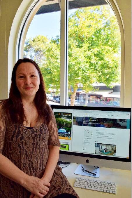 New horizons: Jenny Griffyn with the new online Margaret River Rotary Directory at the RMRD HQ on Main Street. Photo: Nicky Lefebvre