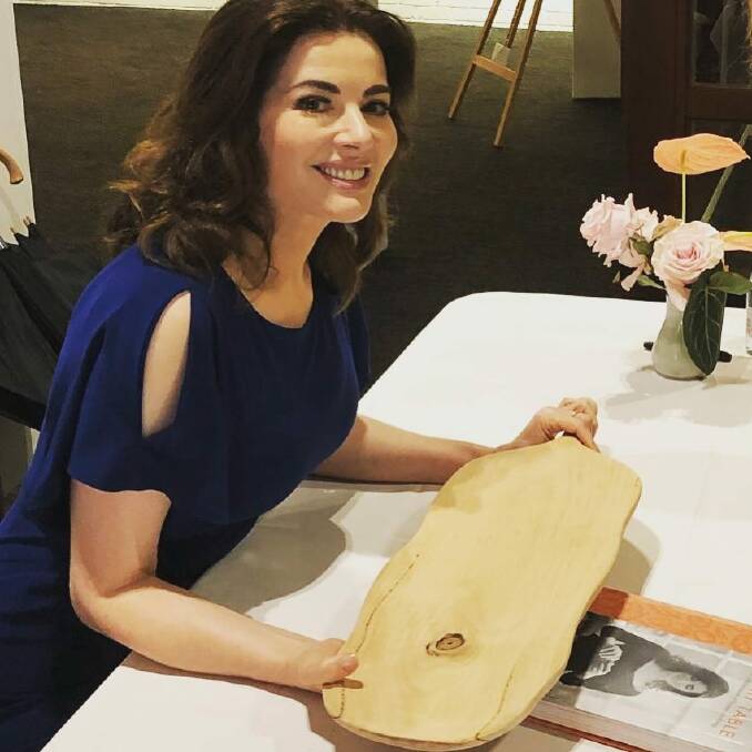Nigella Lawson takes receipt of a genuine 'Jez' Tapas Board at this year's Margaret River Gourmet Escape. 
