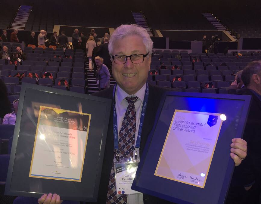 AMR Shire CEO Gary Evershed collects his commendations at the WA Local Government Association's Statewide Convention.