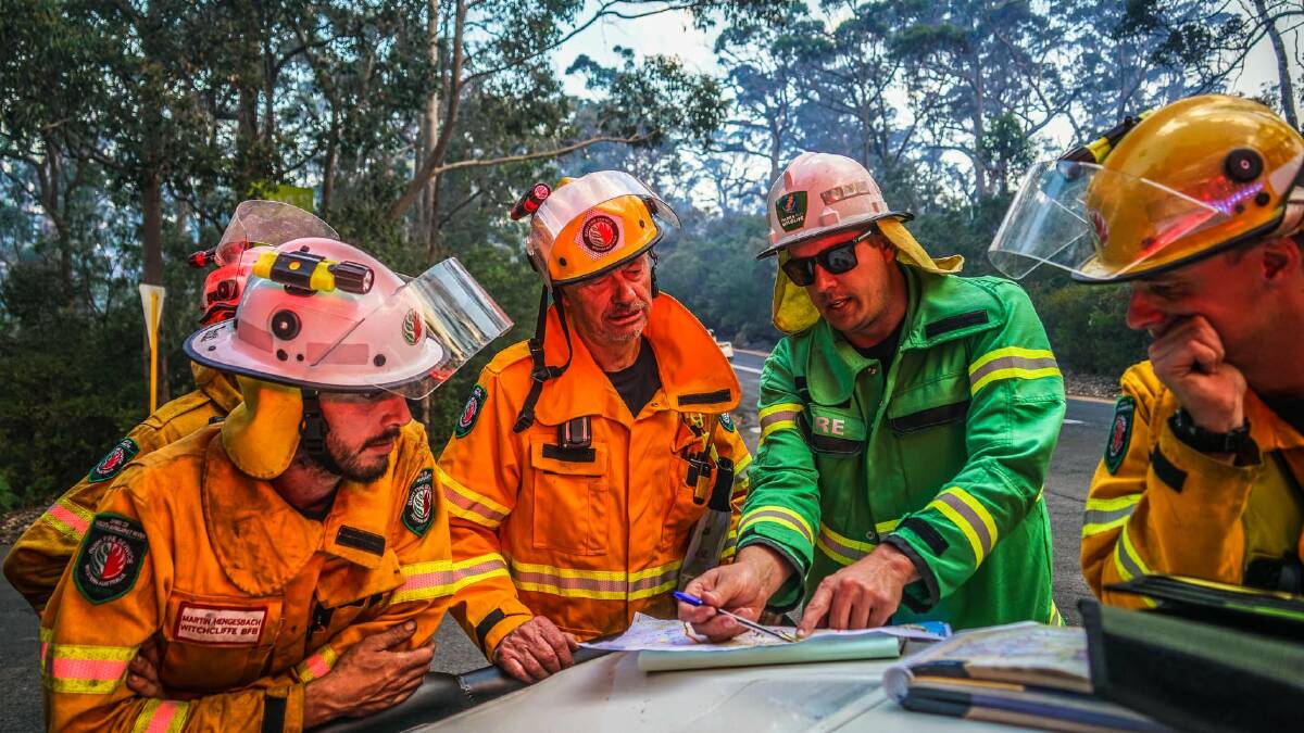Firefighters tackle the out of control bushfire in Boranup, south of Margaret River. Photo: Wallcliffe Volunteer Fire Brigade
