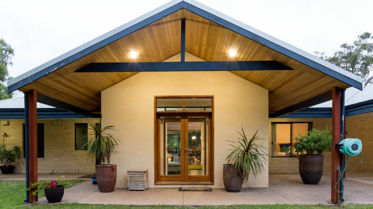 There is a four-bedroom family home and a swimming pool on the property. Photo: Eva Cronin