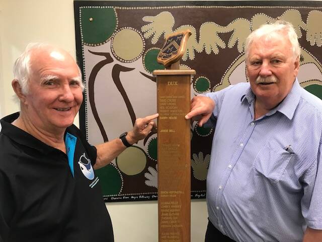 Ian Wiese (Dux 1966) and Barry House (Dux 1967) with the Busselton Senior High School Honour Board. Picture supplied. 