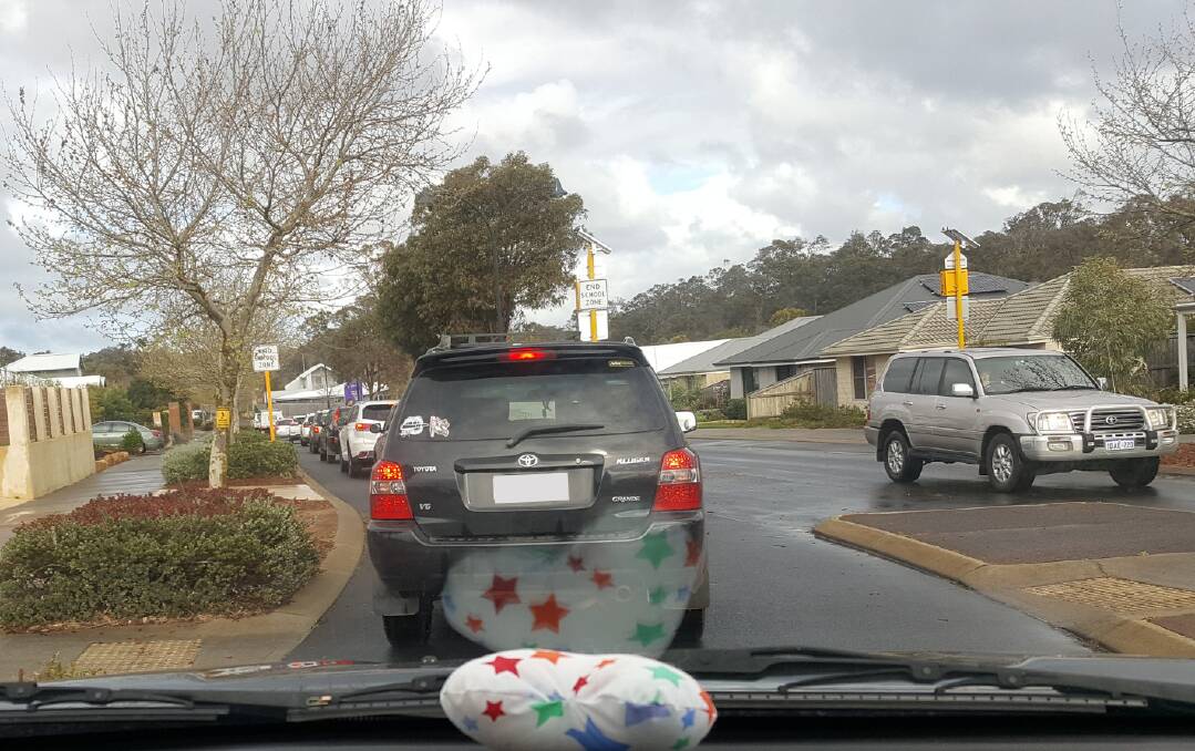 Jam packed: Residents and road users in Rapids Landing battle traffic backed up along Tonkin Boulevard during peak periods. Photo: Supplied.