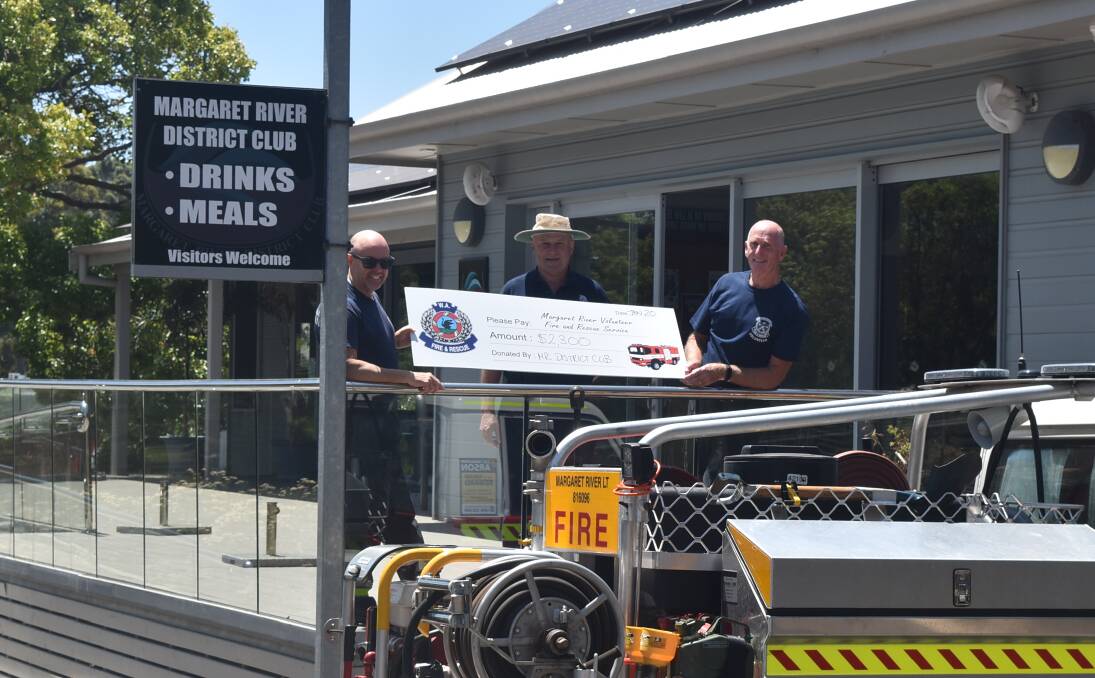 Margaret River District Club President Andrew Forsell (centre) presents the cheque to Wayne and Chris from the Margaret River Volunteer Fire & Rescue service. 