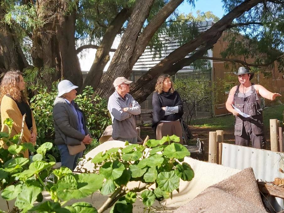 Stuart Carrick (far right) leads an engaging and informative session on composting, in the Margaret River Organic Garden, part of the Just Home Margaret River Life Skills program. Picture: Supplied
