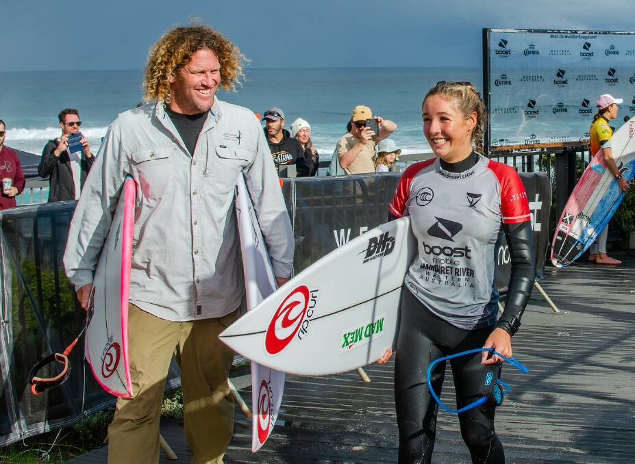 Willow Hardy at Surfers Point with dad Gene; The talented young surfer was mobbed by fans and friends who gathered at the point to witness her compete against some of the world's finest surfers. Photos: Thea McDonald-Lee 
