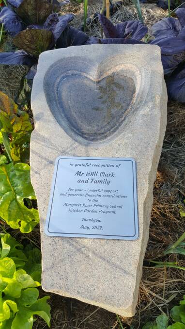 With thanks: A stone water feature with dedication plaque honouring Will Clark and his family was recently unveiled in the school's edible garden. Picture: Supplied