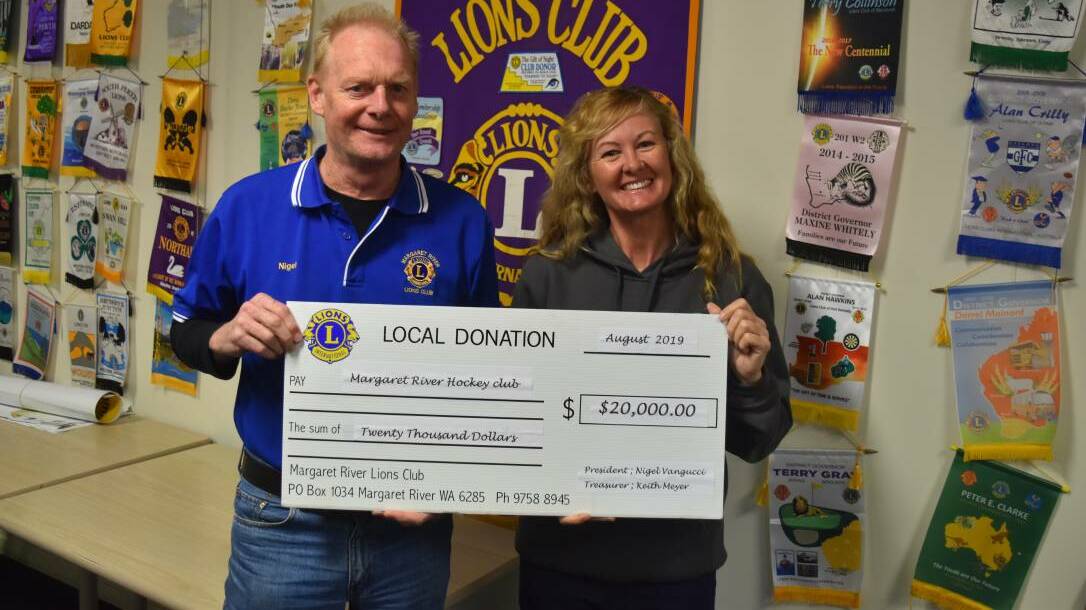 Margaret River Hockey Club President Maxine Williams with Nigel Vangucci of the Margaret River Lions Club, one of the local groups who provided financial support to the turf project. Photo - Nicky Lefebvre