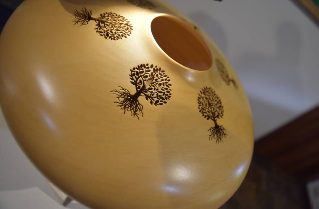 Sarah Scheltema's intricate designs pair beautifully with Ian Thwaites' masterful wood turning. 