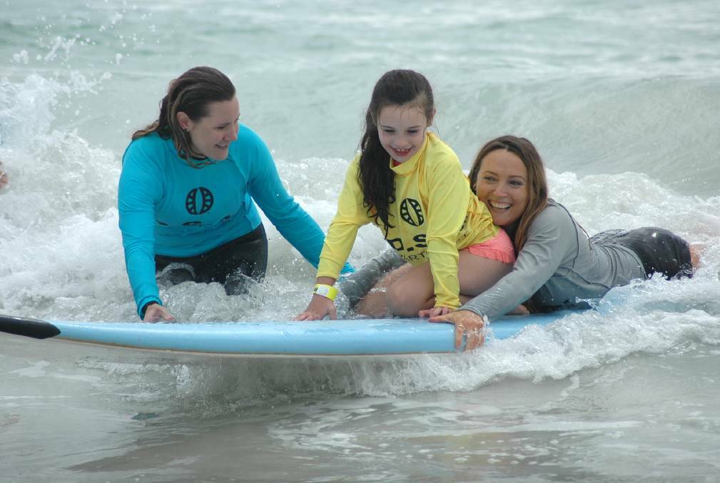 Regular days out at South West beaches help people of all abilities experience the joys of surfing. Photo: Mick Marlin