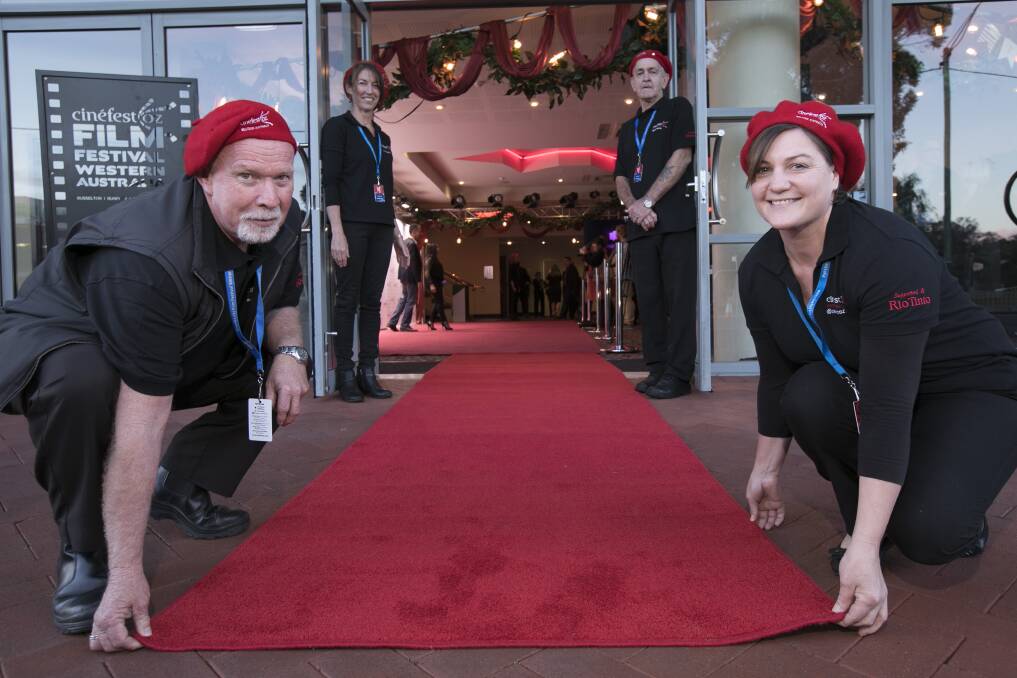 CinefestOZ team members roll out the red carpet. Image Russell Barton