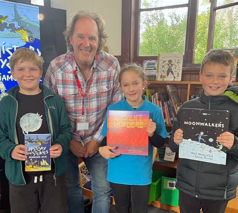 Mark Greenwood with MRIS Year 5 students, Jack McWhirter, Evie Hardy and Louis Gordon. Picture: Supplied
