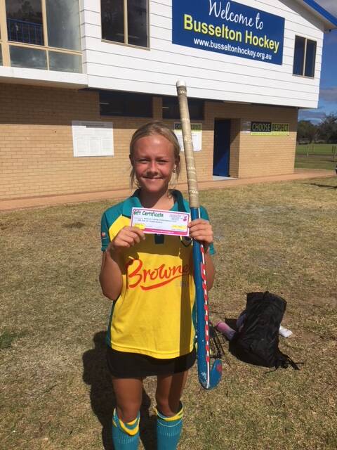 All smiles: Bobbie Rothwell-Hines was the player of the day in the Margaret River Girls 6-8 hockey team's game against the Cavaliers. Photo: Supplied