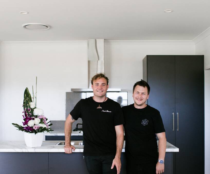Terry McGuirk and Kyle Fittler (right) in their brand new home in Brookfield, a suburb of Margaret River. 