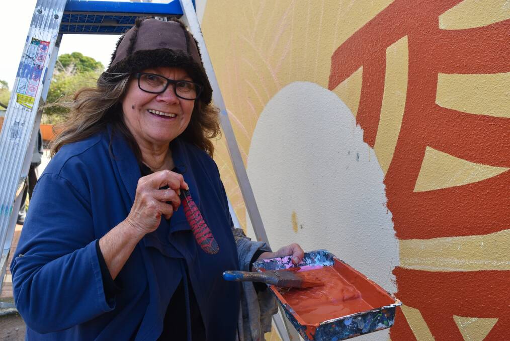 Sandra Hill was taking a break from painting, but couldn't resist the chance to honour her culture by taking part in the mural. 