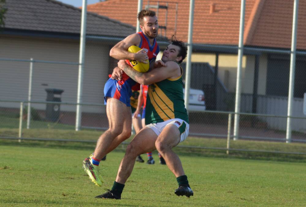 Augusta Margaret River's Jake Rodgers puts the pressure on an opposition Boomer. The side enjoyed a 21 point win over Eaton on Saturday. Photo Jemillah Dawson