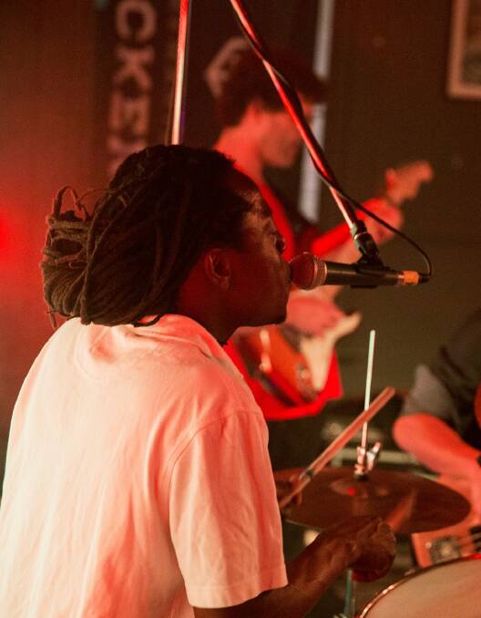 Zimbabwean percussionist George Joe stars in the eclectic world music group.