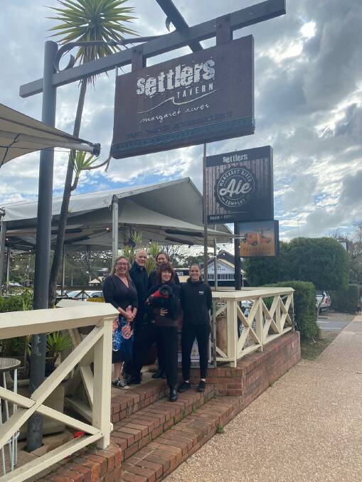 Warren-Blackwood MLA Jane Kelsbie (left) with Rob and Karen Gough and Settlers Tavern team members in front of the newly-covered beer garden. Picture: Supplied