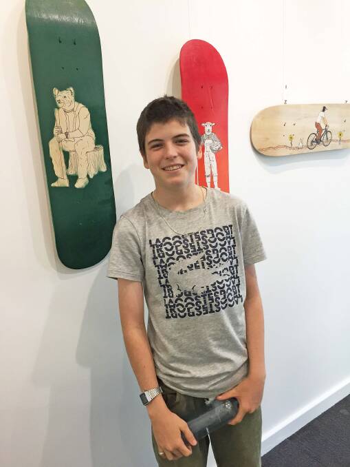 Fourteen year old artist Rudy Selmes at the Cocoon Gallery for Emerging Artists at the Margaret River Library, where his exhibition '1+1' is currently on display until February 27.