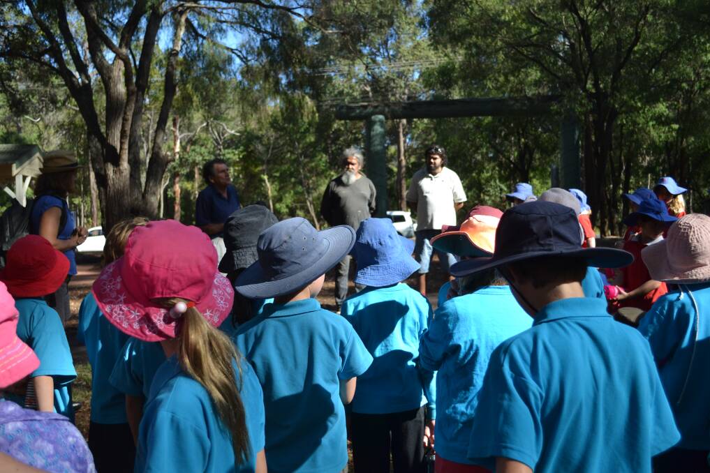 Park project: Students from St Thomas More Catholic Primary School and Margaret River Independent School listen to Rotarian Smiler Gale at Rotary Park, ready for hearing about the local environment from Aboriginal educators Zac Webb and Josh Whiteland.