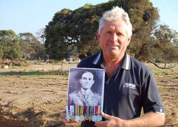 LASTING HONOURS: Ian Earl of Cowaramup with a picture and medals of his late grandfather Roy, a Gallipoli veteran and Military Cross recipient.