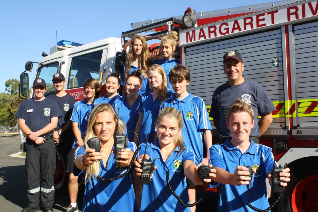 Lesson in radios: Margaret River Volunteer Fire and Rescue Service's Jeff Bushby, Moose Kleinjan and Andrew Vorwerg work on communication skills with Margaret River Senior High School Emergency Service cadets. Students Carly Palandri, Taylor Kevill and Sebastian Miller show off their new radios.