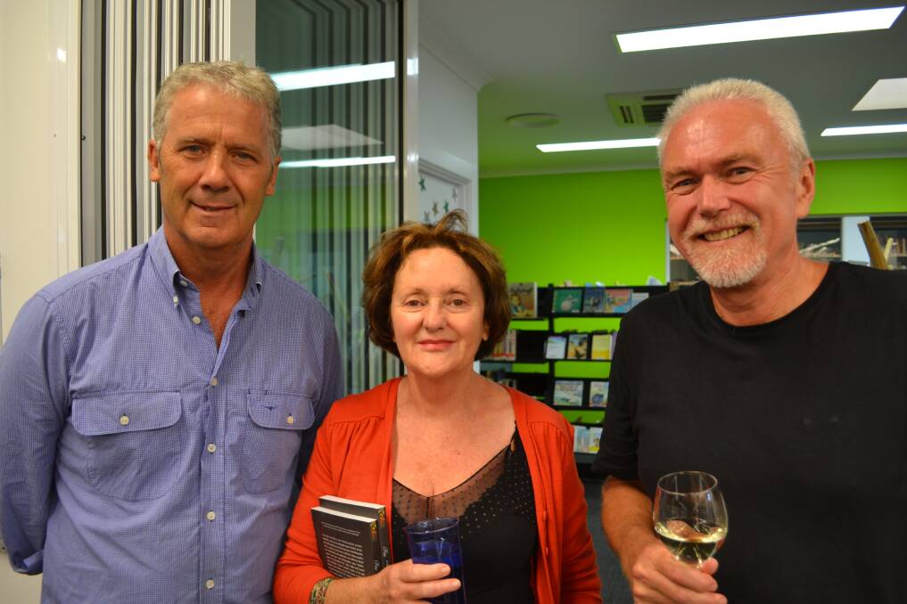 Socialising: Cr Neville Veitch, Jenni Montgomery and Mike Rumble, who contributed a photo essay to the book.