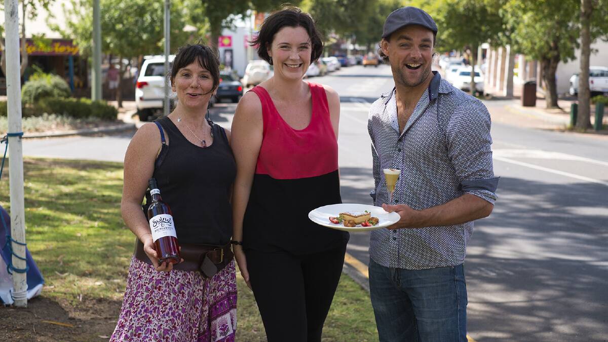 Meal on the move: Swings manager Annie Murphy, shuffle organiser Kendall Galbraith and Morries Anytime bartender Billy Philips prepare for fund raiser.                             Photo: Sandy Powell