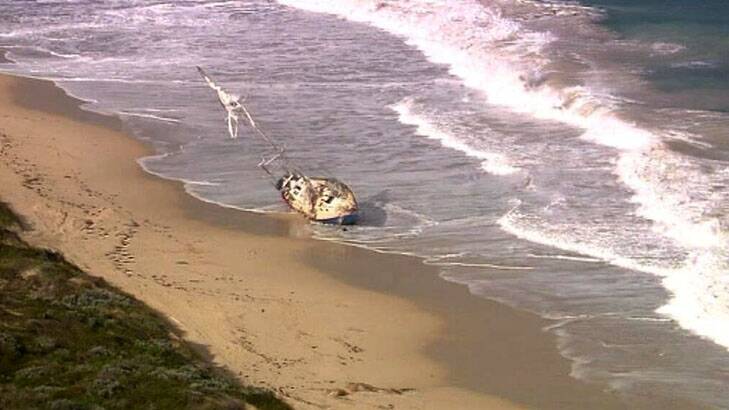 The stricken yacht, after it washed up on shore. Photo: Channel Ten
