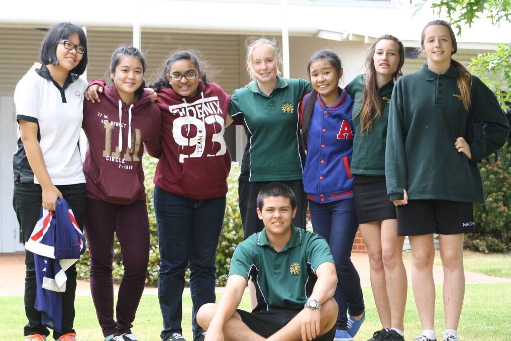 Comparing cultures: Singapore and MRSHS students Chongjing Tan, Ginny Ng, Bianca Charles, Ella Keightley, Lewin Loh, Kirrily Mills and Kiera Haworth with Divan Reinecke, front.