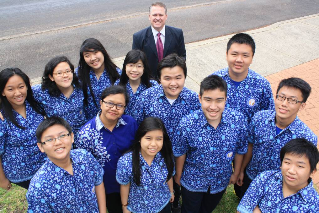 All together: Margaret River Senior High School principal Andrew Host with year 11 students from Indonesia.