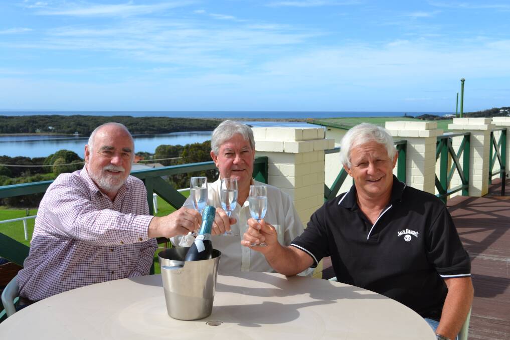 HAPPY BIRTHDAY: Hotel director Ted Coulter, managing director Jim Challis and manager Col Nairn preparing to toast the hotel's 100 years.