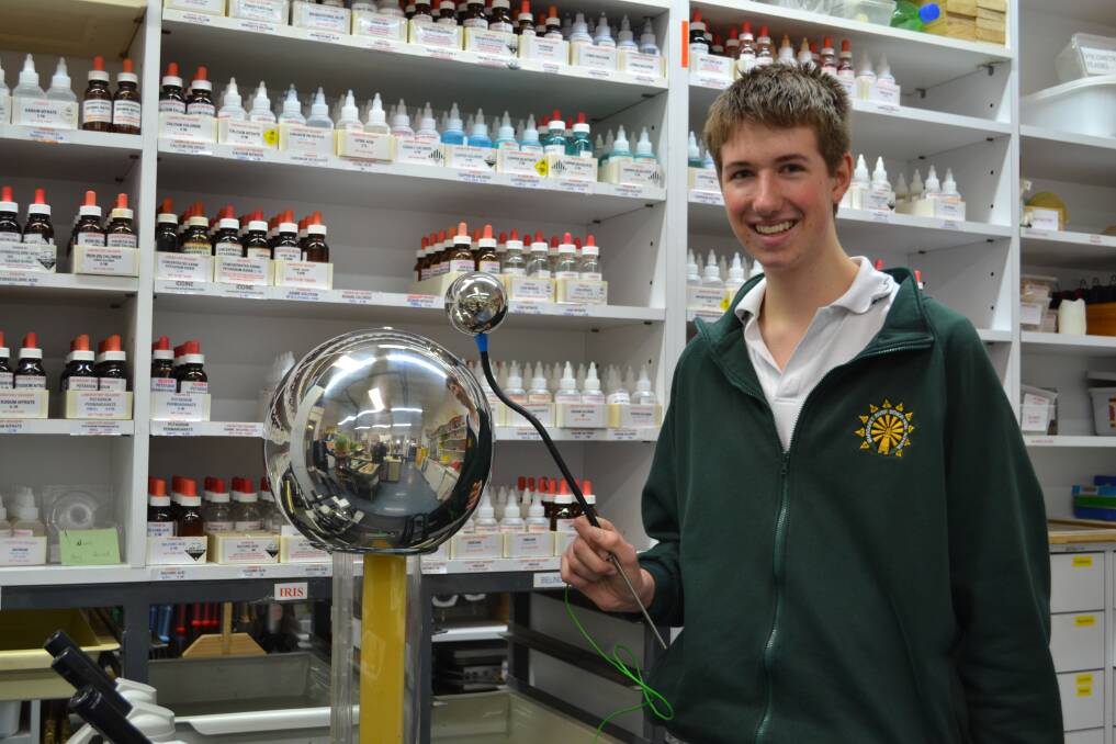 SCIENTIFICALLY MINDED: Pictured above with a Van De Graaff electrostatic generator that demonstrates electricity, Rhys Eagle will put his aptitude for science to good use in Canberra at a national forum.