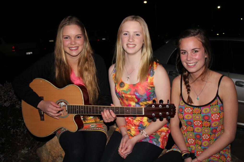 THE THREE GEES: Gemma Spencer, Geena Dickson and Grace Goodwin, year 11, practice their act in the car park.
